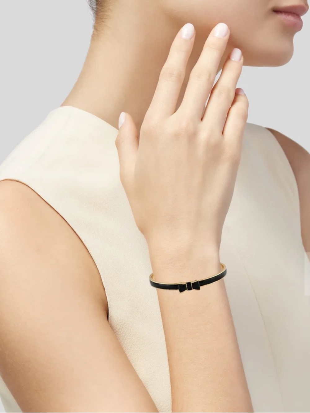 KATE SPADE NEW YORK ENAMEL BOW BANGL